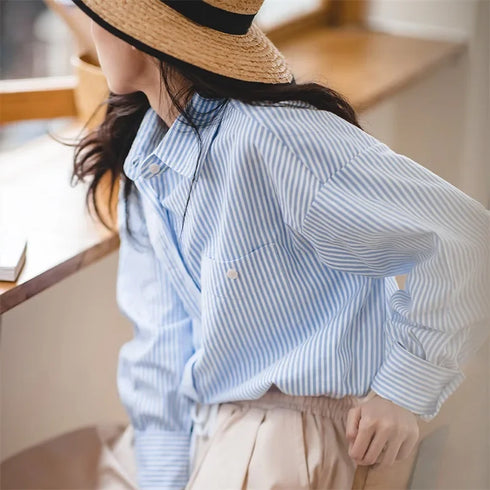 Women's French striped shirt in blue and white with turn-down collar and long sleeves, perfect for casual or office wear.